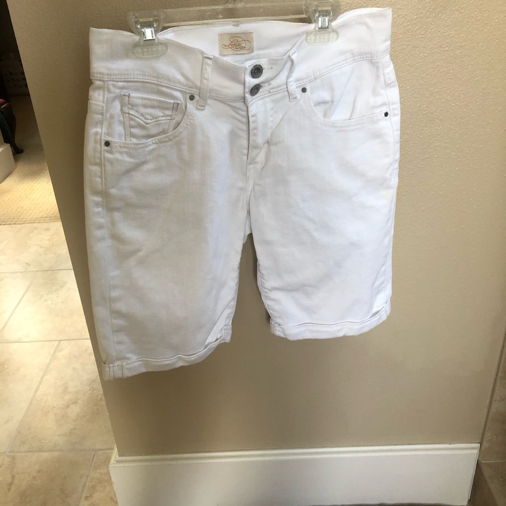 Levi’s Jean shorts. White. Size 4. Cuffed.
